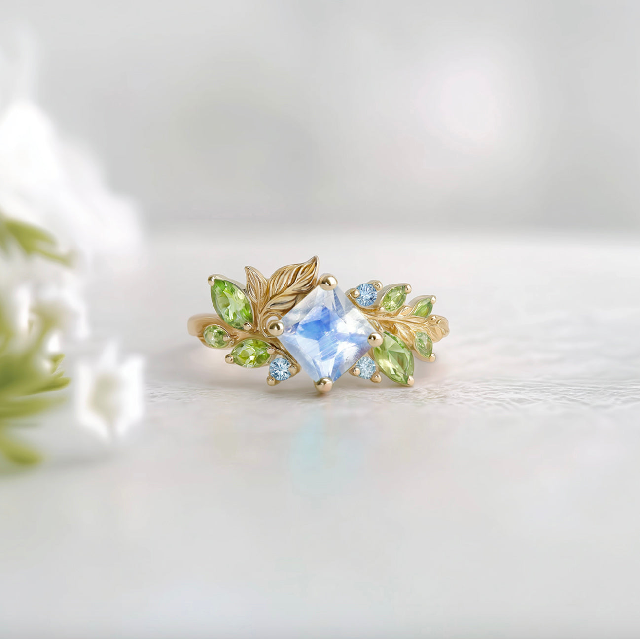 The Moonlight Canvas Engagement Ring – Square Moonstone Set in a Blooming Vine Band
